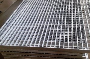 Panels of aluminium grating stacked on top of each other