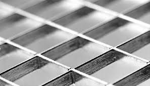 a close up of a piece of stainless steel grating